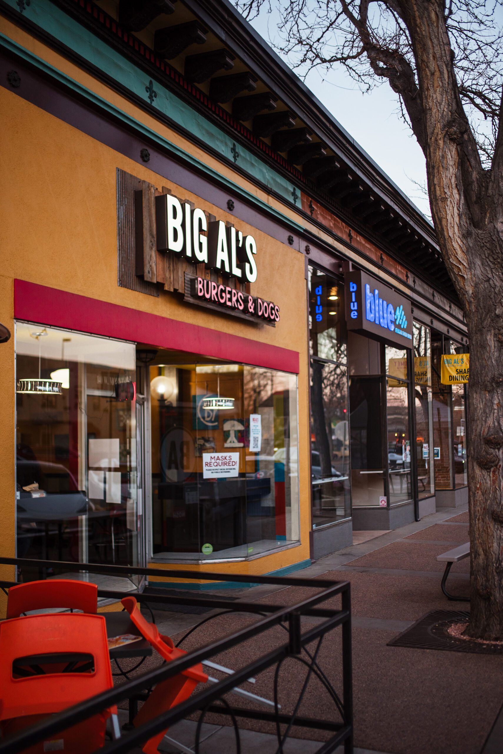 Big Al's Burgers and Dogs in Old Town Fort Collins, also shown is illuminated Blue Credit Union channel letters ign